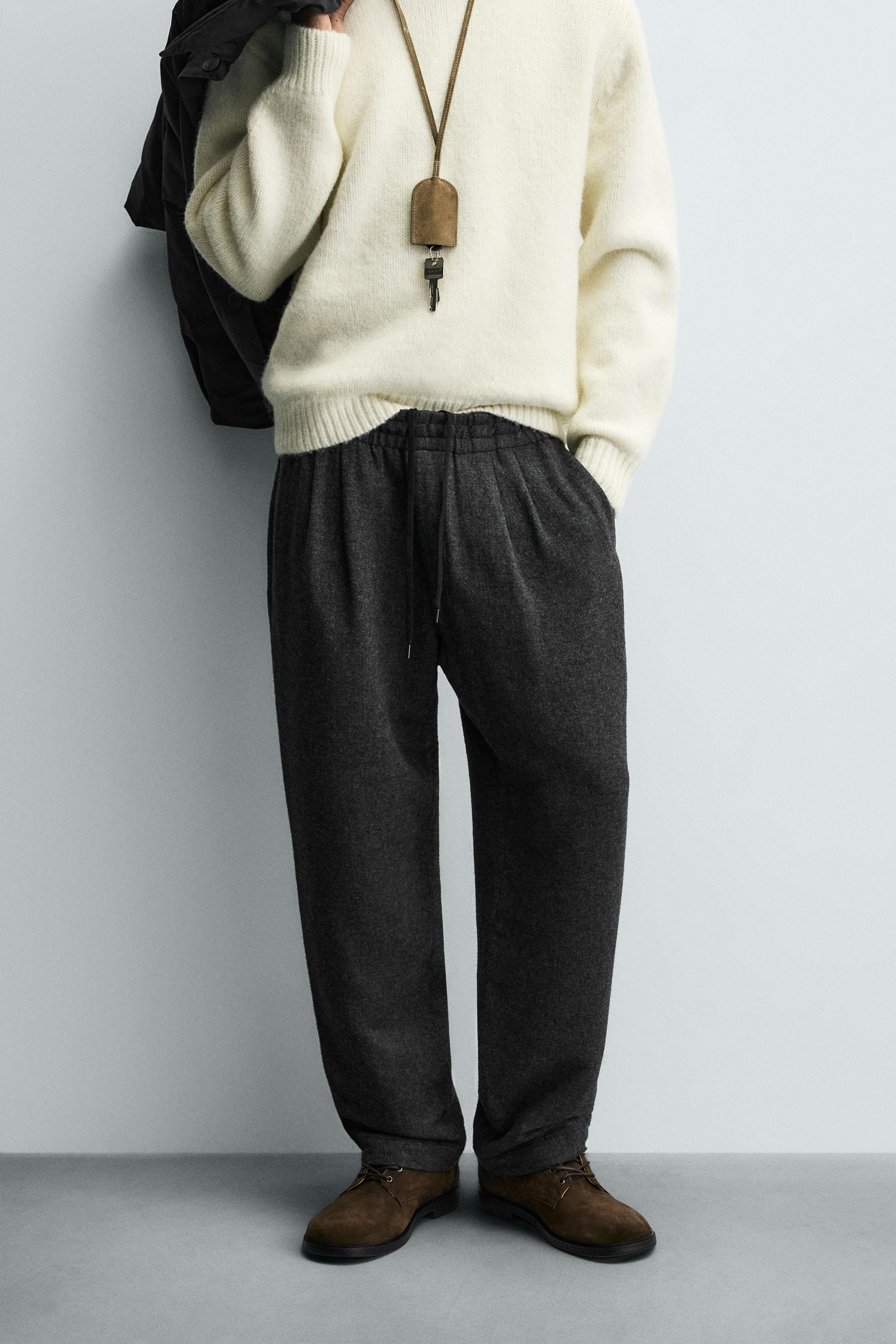 PLEATED WOOL PANTS